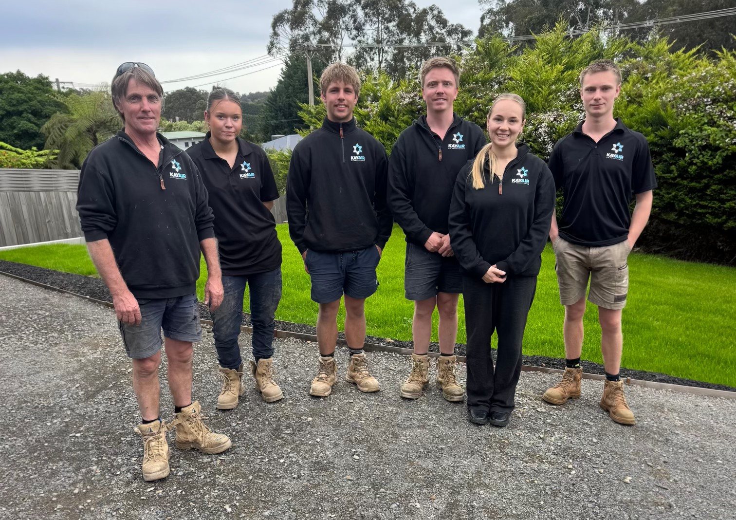 The KayAir team in their work shirts